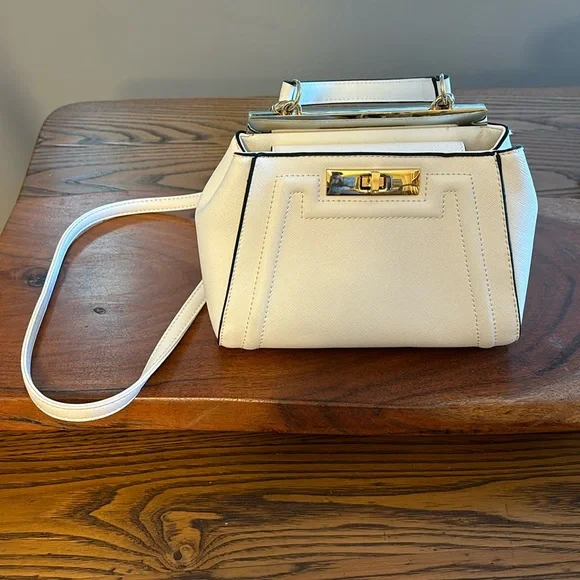 NWOT Aldo white handbag with black trim. Removable Crossbody Strap. - Picture 2 of 7